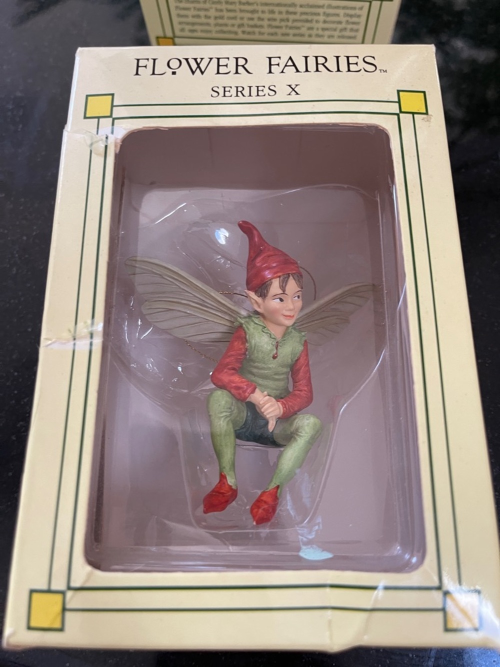 Flower Fairies Series X Seated Pixie Figurine in Green & Red